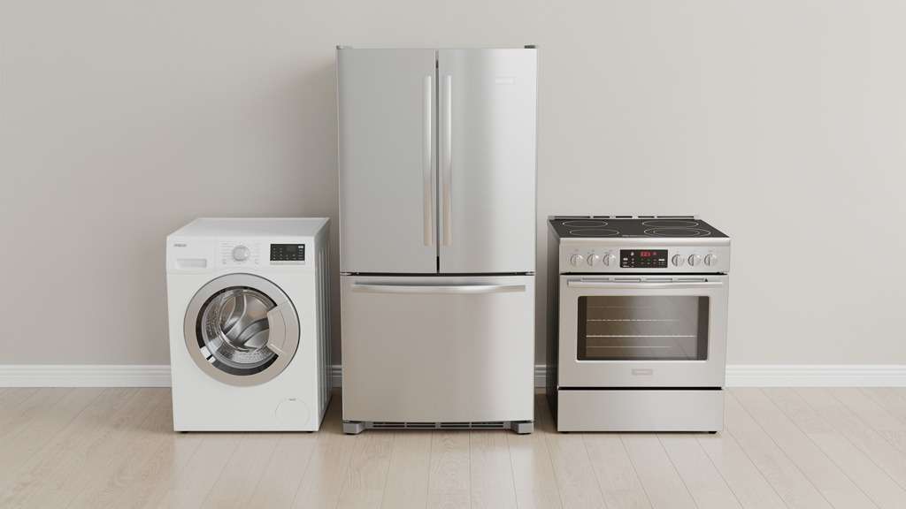 A sparkling clean refrigerator, washing machine, and oven in a modern home, symbolizing well-maintained appliances.